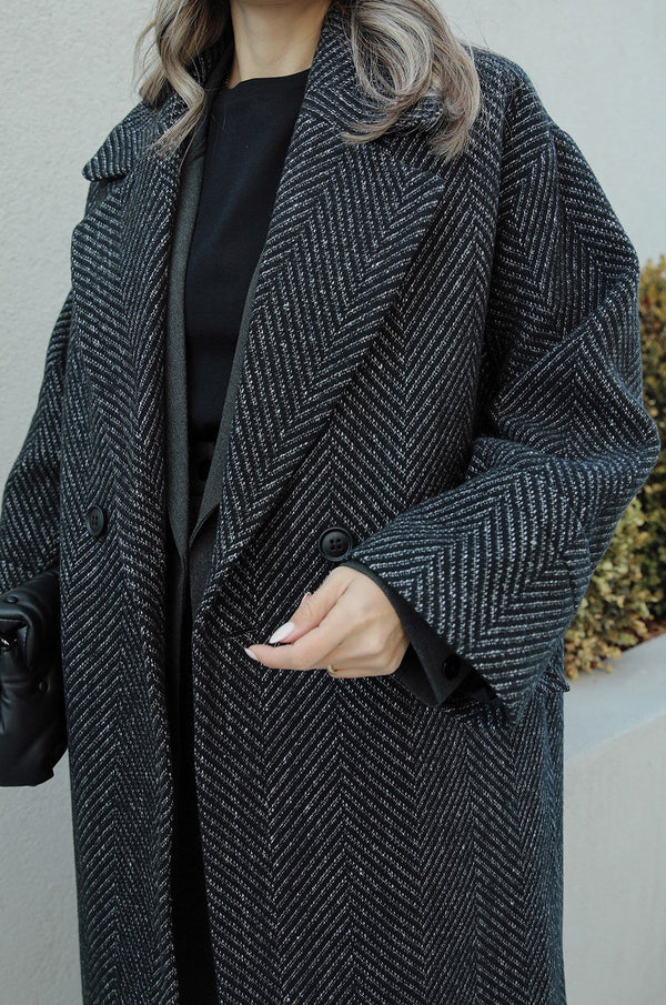 معطف بنقشة باللون الاسود