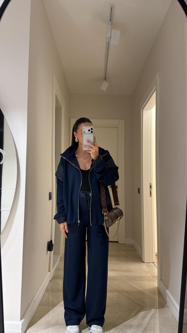 طقم ماركة بسحاب أمامي بتفاصيل قماش باراشوت