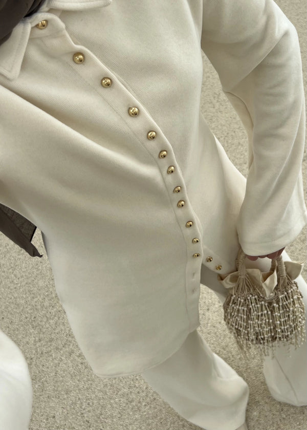 طقم قطعتين ازرار ذهبية بيج