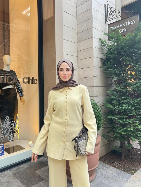 طقم قطعتين ازرار ذهبية - زبدة