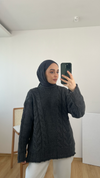 بلوزة محبوكة سميكة مفصلة